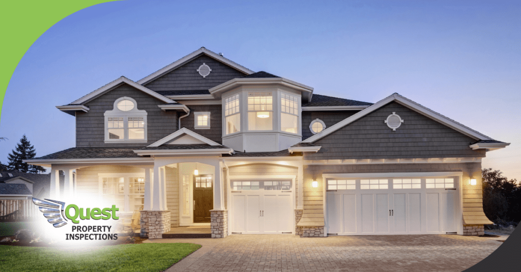 Two-story suburban house with illuminated porch