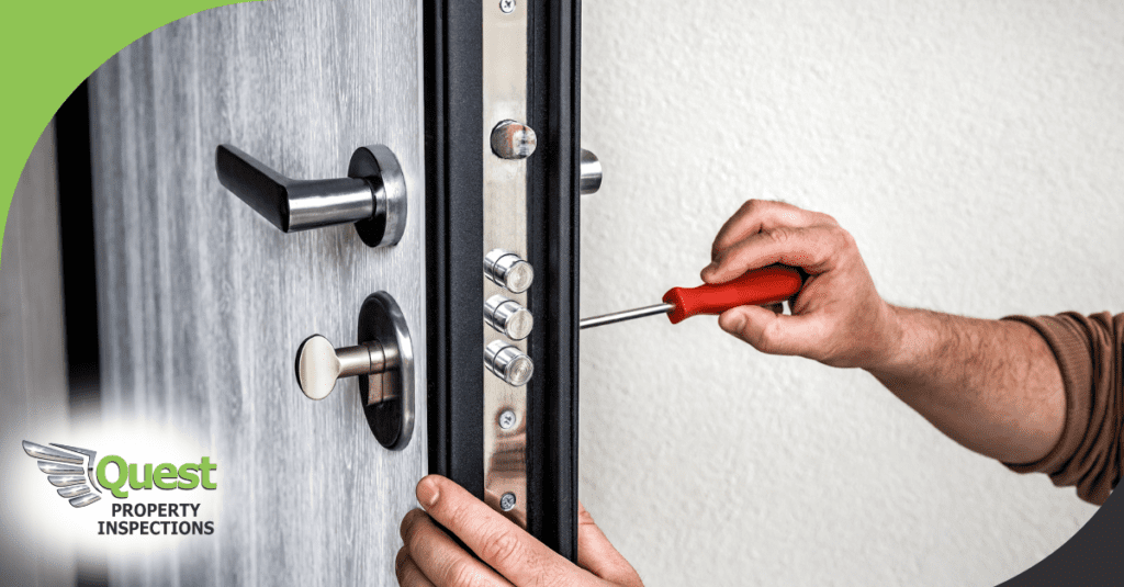 Hands tightening security door bolts with screwdriver